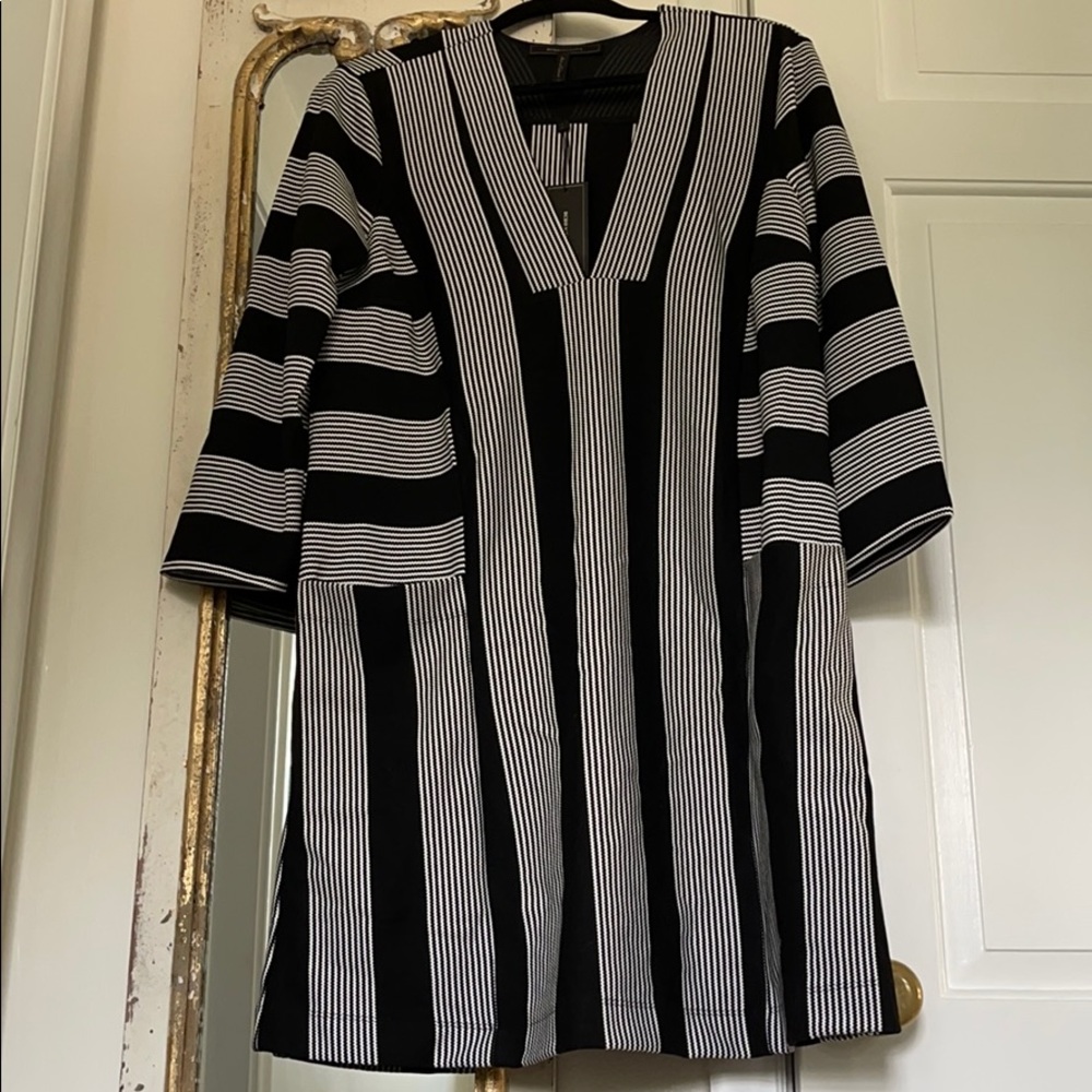 NWT knee length beautiful dress.